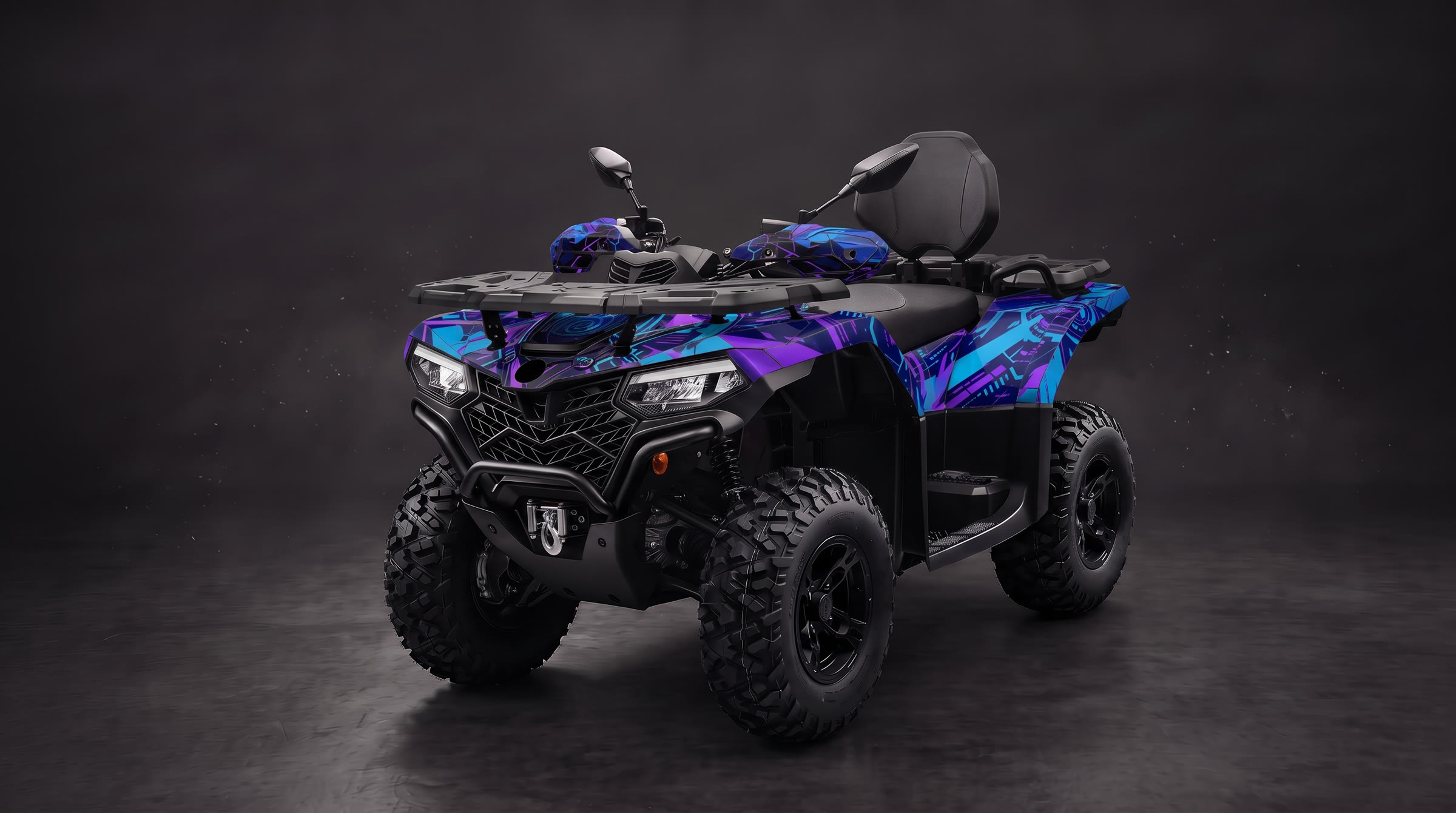 An ATV with a Wraplook wrap - purple and cyan geometric graphic, studio shot.